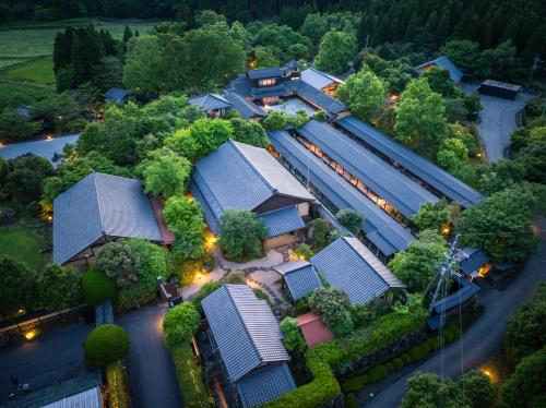 an overhead view of a house with solar panels at Cultural Resort Meihodo in Matoishi