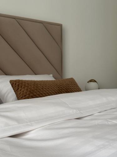 Postel nebo postele na pokoji v ubytování The Comfort Suite