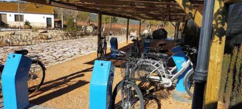 a group of bikes parked next to a building at Casas Rurales Laguna La Tinaja in Ossa de Montiel