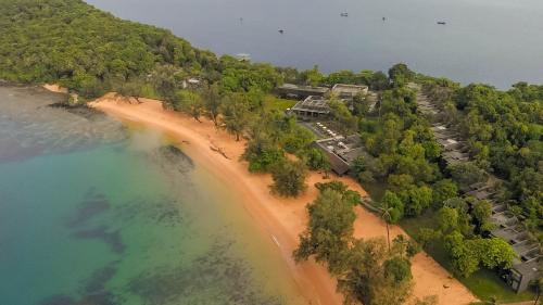 an aerial view of a beach with a resort at Koh Russey Resort in Koh Russey