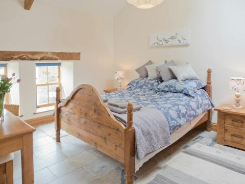 Postel nebo postele na pokoji v ubytování Creigiau Cottage Llansteffan