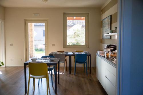 Kuchyň nebo kuchyňský kout v ubytování B&B LA VALLUNA