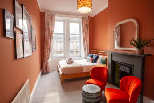 a small bedroom with a bed and a window at Newly Renovated Flat in Trendy Finnieston in Glasgow