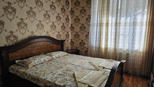 Ένα ή περισσότερα κρεβάτια σε δωμάτιο στο 2 rooms Apartment