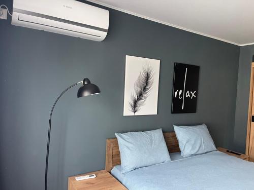 Ένα ή περισσότερα κρεβάτια σε δωμάτιο στο V apartament - ultra central Otopeni