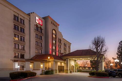 a hotel with a sign on the side of it at Best Western Plus Heritage Inn Ontario Rancho Cucamonga in Rancho Cucamonga