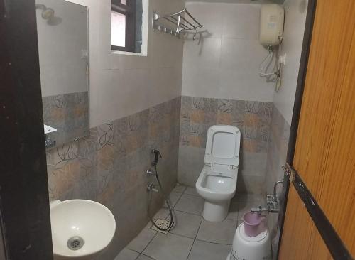 Koupelna v ubytování Hotel Krishna Guesthouse