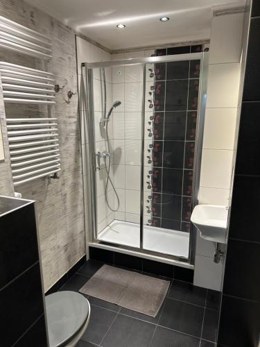 Kúpeľňa v ubytovaní APARTAMENT NAD KAMIEŃCZYKIEM II