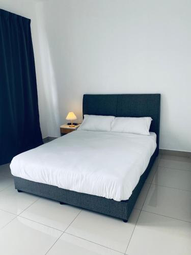Ένα ή περισσότερα κρεβάτια σε δωμάτιο στο Cloud Nine Homestay
