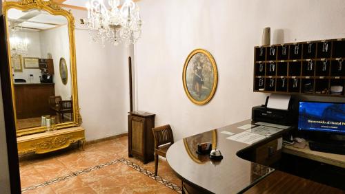 TV a/nebo společenská místnost v ubytování Hostal Prada
