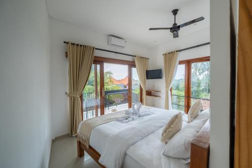 Katil atau katil-katil dalam bilik di Lemon Tree Hotel Bali