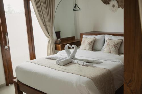 Katil atau katil-katil dalam bilik di Lemon Tree Hotel Bali