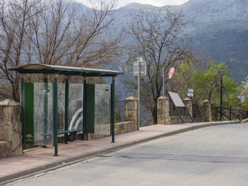 a bus stop on the side of a road at Cubo's Casa Rural La Albahaca de Libar in Jimera de Líbar