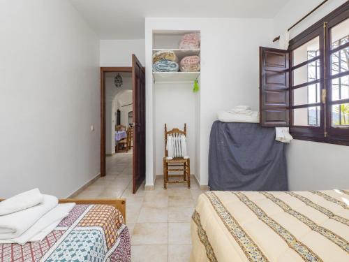 Postel nebo postele na pokoji v ubytování Cubo's Casa Rural Los Lirios de Libar