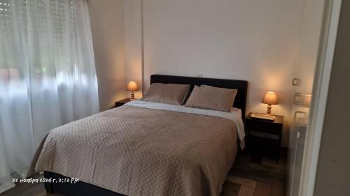 En eller flere senge i et værelse på Deana beach