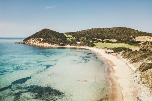 an aerial view of a beach and the ocean at Villa Lucia in Alghero