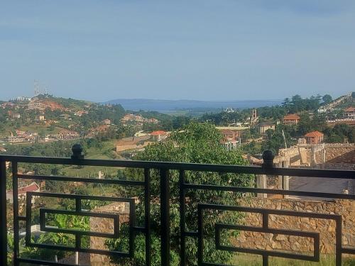 a view of a city from a balcony at Beautiful 2-Bed Apartment in Akright City Bwebajja in Namulanda