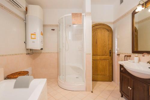 a bathroom with a shower and a sink at Villa Gea in Praiano