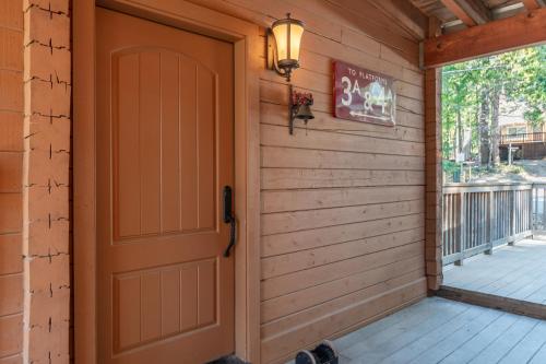 a door to a porch with a light on it at Wilsons Roost in Dorrington