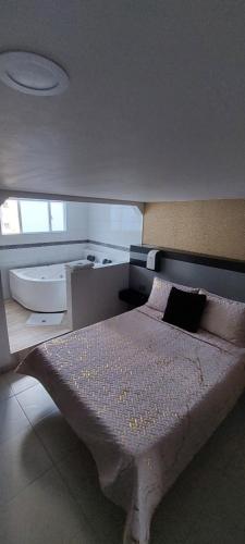 Кровать или кровати в номере Hotel Boutique San Sebastián Chapinero