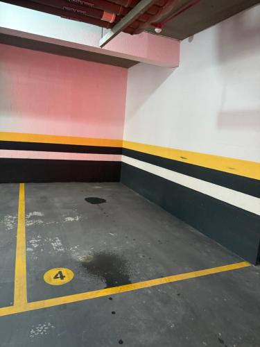 an empty parking garage with a painted wall at Gerizim in Vila Velha