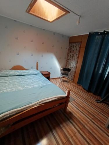 Postel nebo postele na pokoji v ubytování Hostal Caleta Abarca