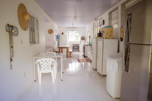 Kuchyň nebo kuchyňský kout v ubytování Casa de campo cercada pela natureza com WiFi