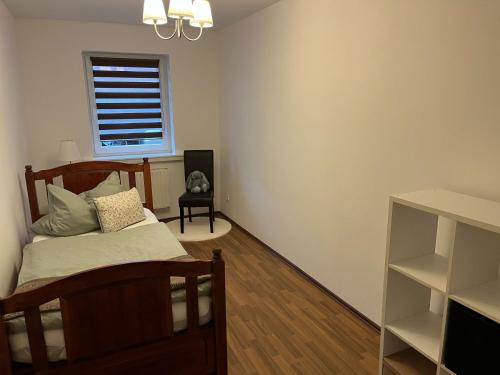 Una cama o camas en una habitación de Trebelsee Monteurwohnung und Fewo