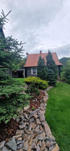 a stone path in front of a house at Drevenica Remata in Ráztočno