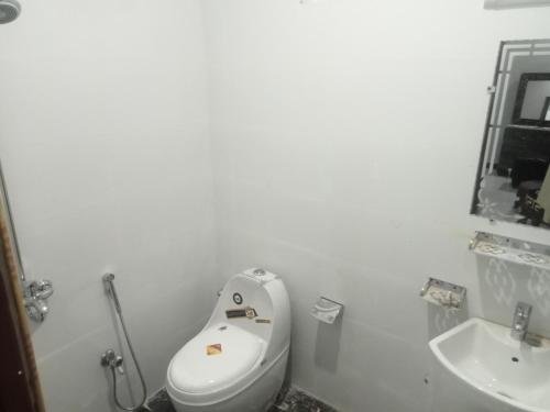 Ένα μπάνιο στο CH Rayzm Family Guest house