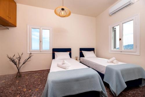 Postel nebo postele na pokoji v ubytování The Z House Santorini
