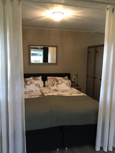 Postel nebo postele na pokoji v ubytování Vakantiehuisje B&B de Kleine Voskuil