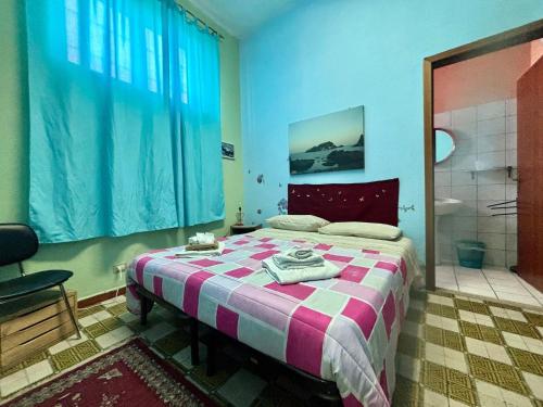 Кровать или кровати в номере BB Sciddicu Rooms, Lg