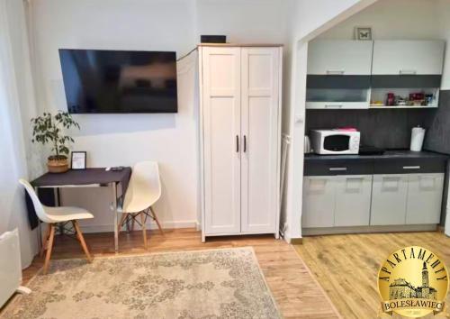 Kuchyňa alebo kuchynka v ubytovaní Apartamenty Bolesławiec Prusa