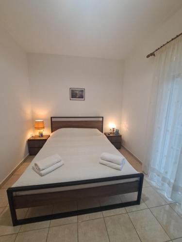 Postel nebo postele na pokoji v ubytování Patara's Apartment