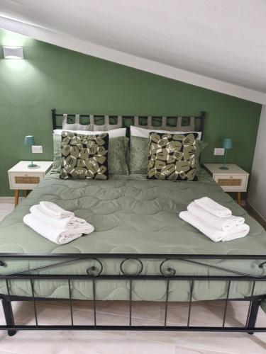 En eller flere senge i et værelse på La Casina Verde