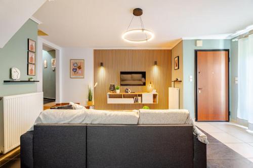 a bedroom with a large bed in a room at Fab Maisonette 100m2 - Private courtyard - JK 7towers -Old City Center in Thessaloniki