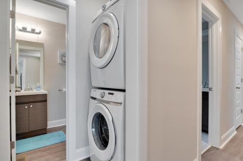 a laundry room with a washer and dryer at Spacious 4-bedroom Marietta Home w/ free parking in Marietta
