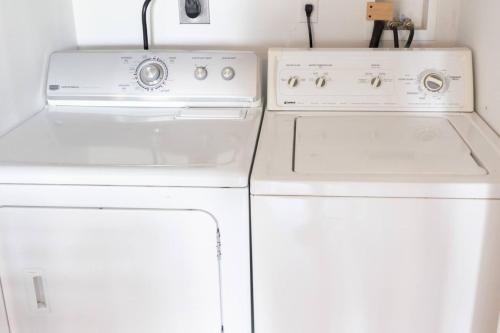 two white appliances in a kitchen next to each other at 2 Beautiful 1 BR Apartment - Central CT in Plainville