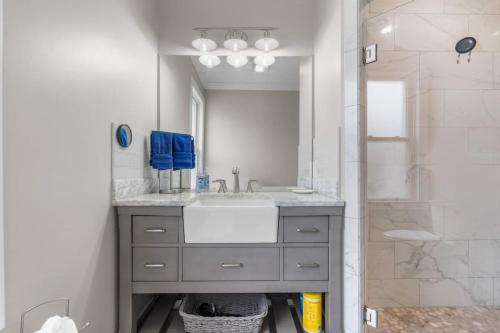 a bathroom with a sink and a shower at 34- Stunning-Newly Remodeled in Old Lyme