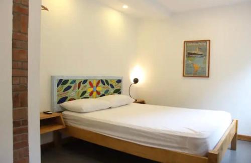 Postel nebo postele na pokoji v ubytování CASA DINIS - Apartamento Estudio