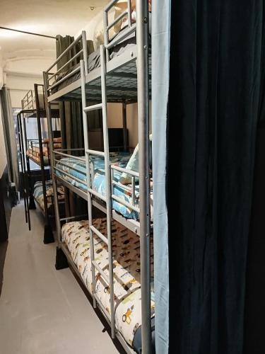 Dortoir en partage lit individuel