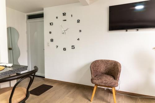 Apartamento via TERMALES Y LOS NEVADOSにあるテレビまたはエンターテインメントセンター