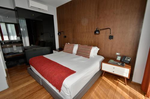 Ein Bett oder Betten in einem Zimmer der Unterkunft Hotel Love It CAS Consulado