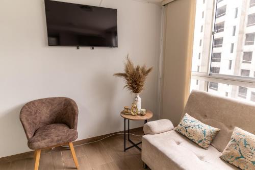 Apartamento via TERMALES Y LOS NEVADOSにあるテレビまたはエンターテインメントセンター