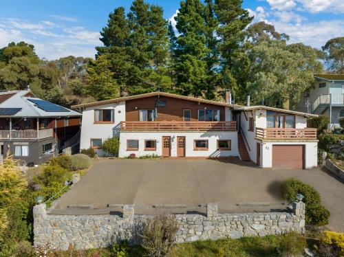 an aerial view of a house with a large driveway at Elvira Ski Haus in Jindabyne