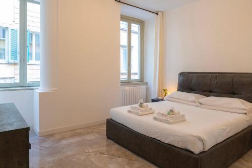 Postelja oz. postelje v sobi nastanitve Magic Place Bergamo! Classy Apartment in the heart of the city