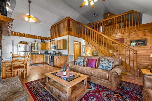 a living room with a couch and a table at Golden Valley Retreat in Townsend