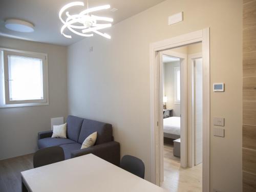 Katil atau katil-katil dalam bilik di Stylish Duplex in Verbania