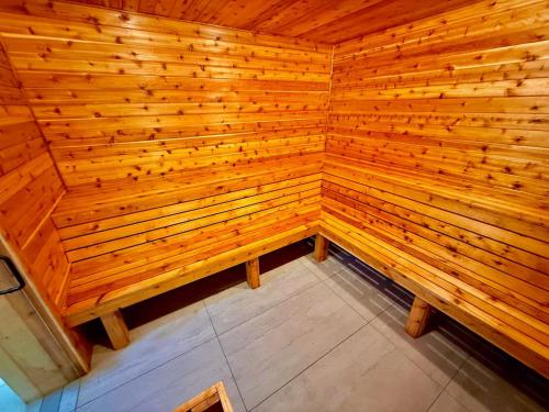 an overhead view of a wooden sauna at Ultimate Luxury Villa - Pool, Sauna, Hot Tub & More in Paterson